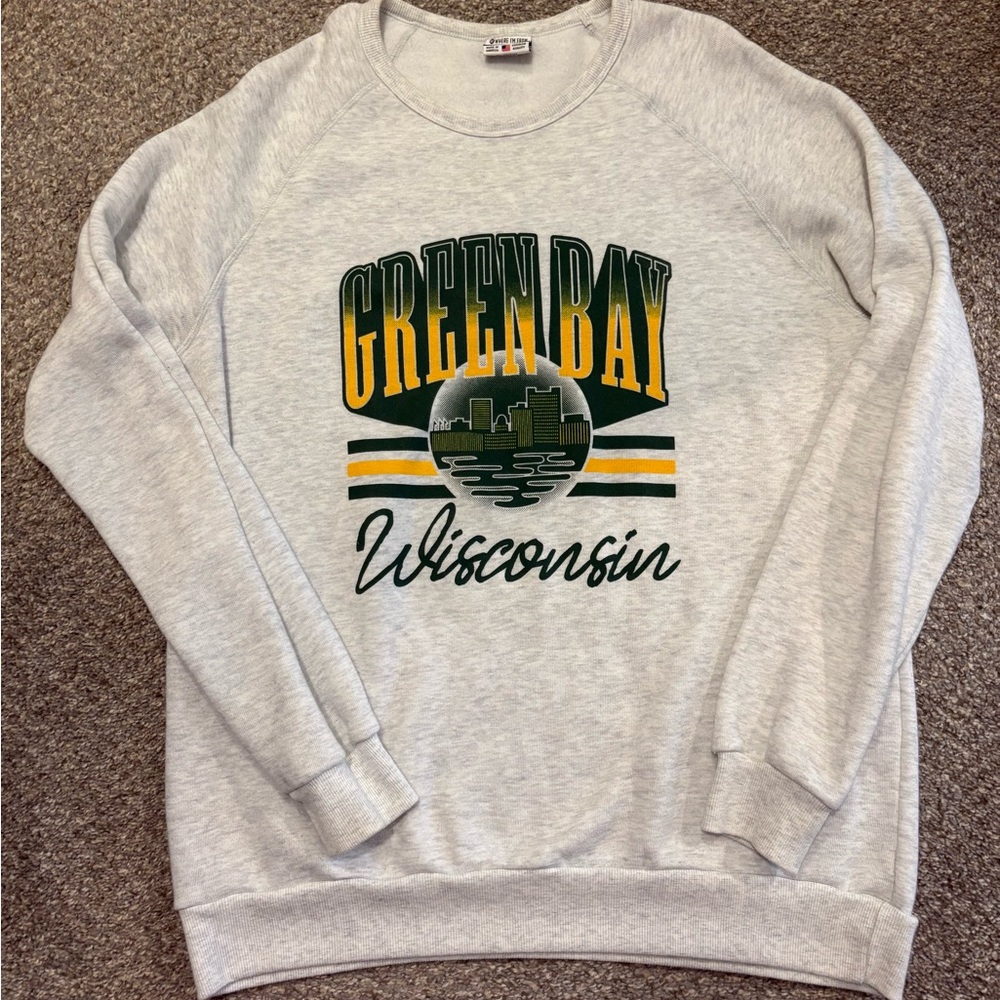 Gray Collegiate Sweatshirt with Vintage Athletic Graphics